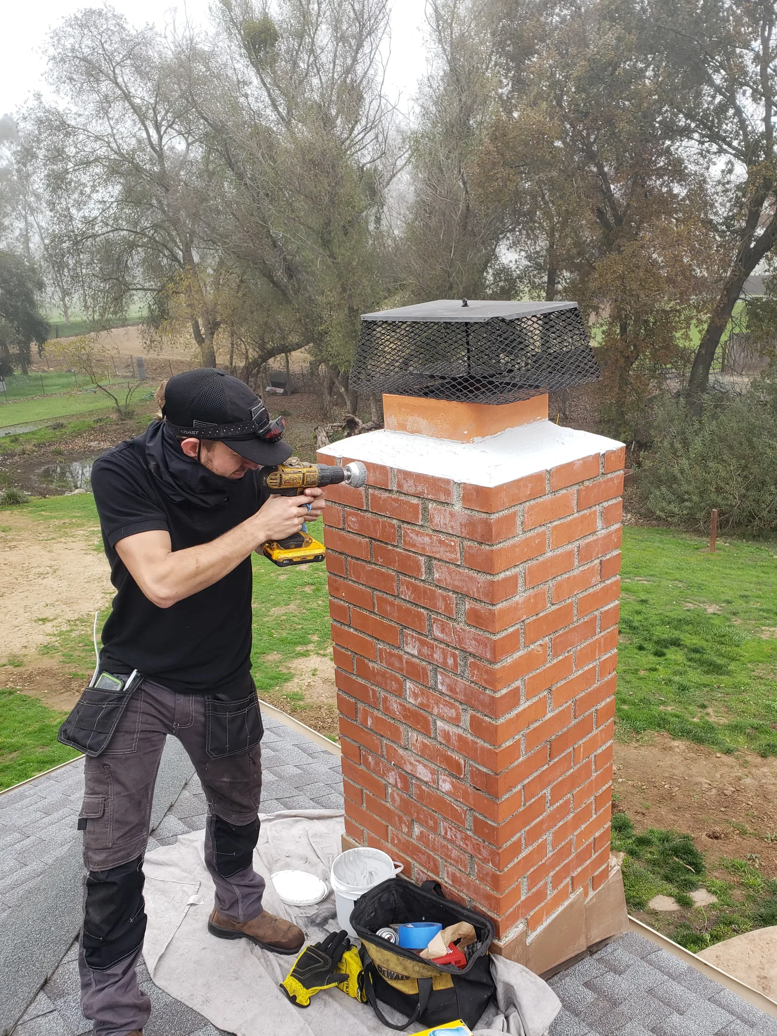 A rebuilt crown and new cap finished on a brick chimney